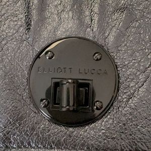 Beautiful NWOT Elliot Lucca leather clutch. Great Fall bag..! Grab it ladies..!